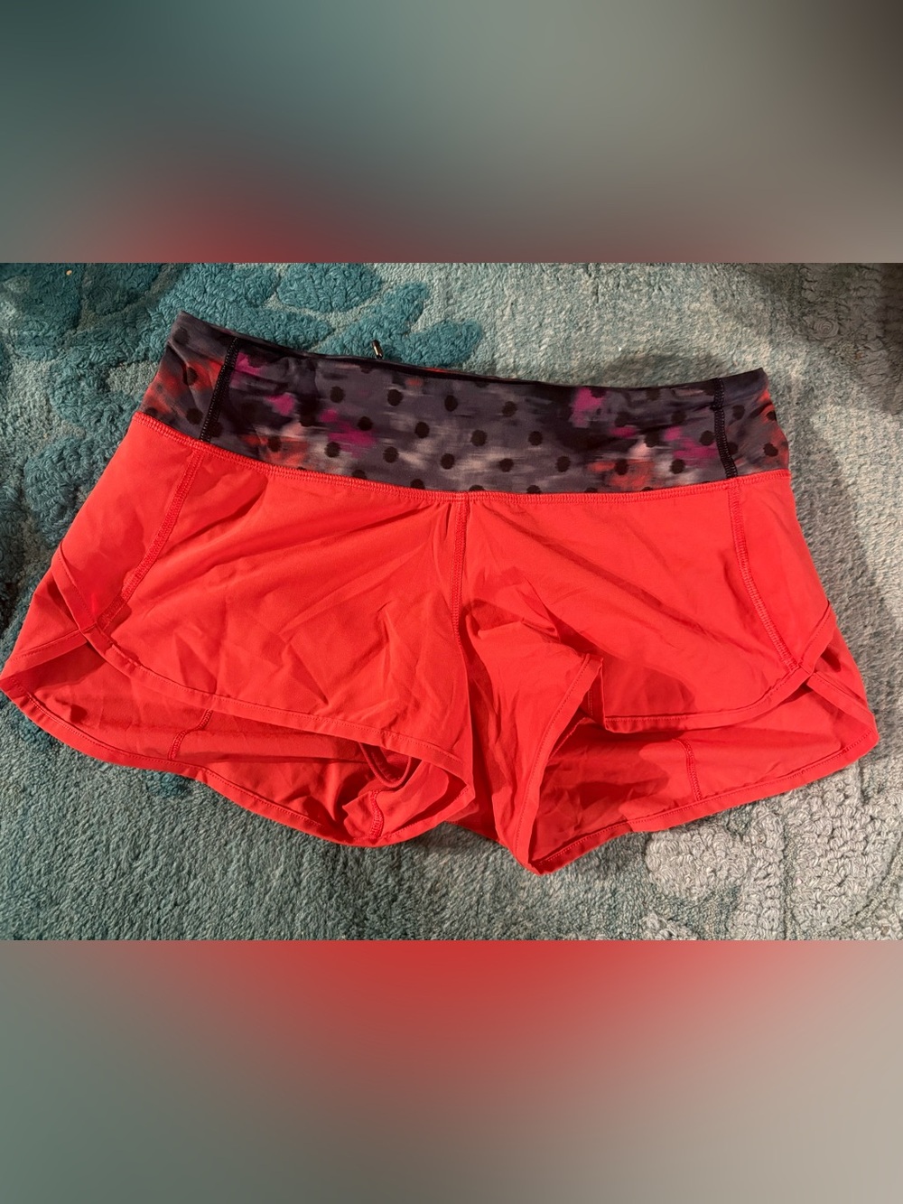 Lululemon Speed Shorts in the color Alarming